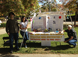 Students around ASM display table on the Rocklin campus.
