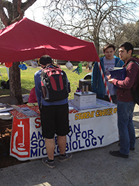 Students visiting ASM display table on Rocklin campus.