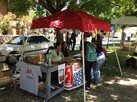 Students around ASM display table on the Rocklin campus.